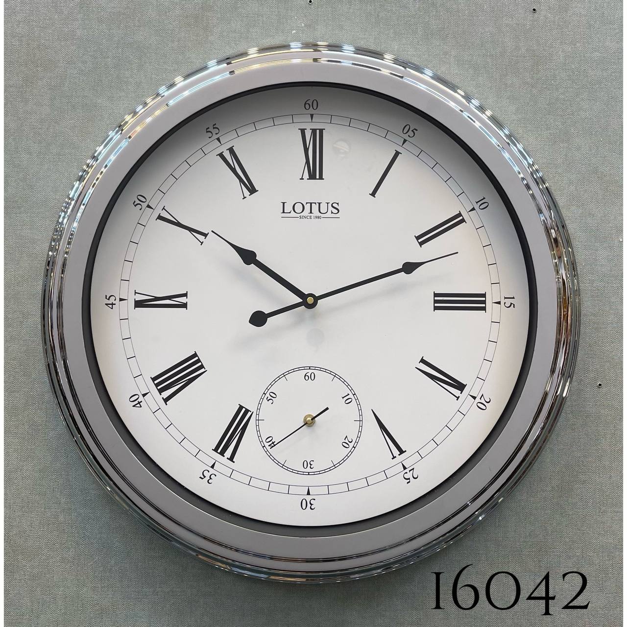 ساعت دیواری لوتوس کد۱۶۰۴۲ قطر ۶۰ نقره ای